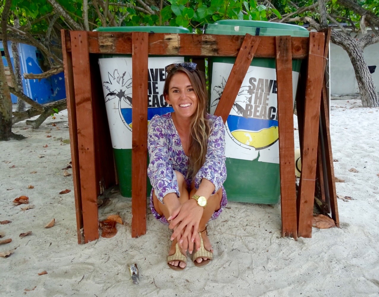 Guest-near-trashbins-made-by-local-NGO-Save-The-Beach-Maldives-in-Villingili