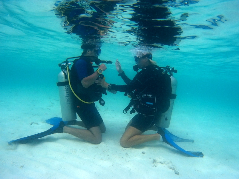 An-diving-instructor-with-guest-taking-part-in-a-discover-scuba-diving-experience