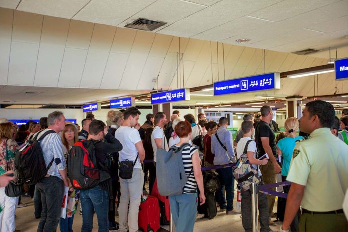 Tourists-line-up-infront-of-Maldives-Immigration-Counters-at-Velana-International-Airport-in Maldives
